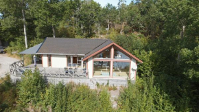 Holiday home in Dalskog with a panoramic lake view
